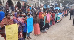 জয়পুরহাটে আদিবাসী ছাত্র-জনতার মানববন্ধন ও প্রতিবাদ সমাবেশ